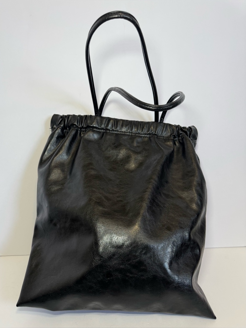 Black patten leather purse from ZARA